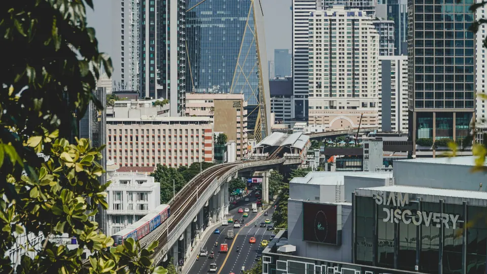 Elevated BTS tracks and city buildings near Siam Discovery in Bangkok