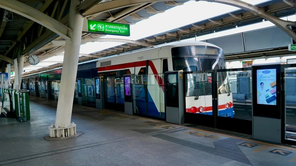 A BTS Skytrain stopped beside the platform at On Nut station in Bangkok