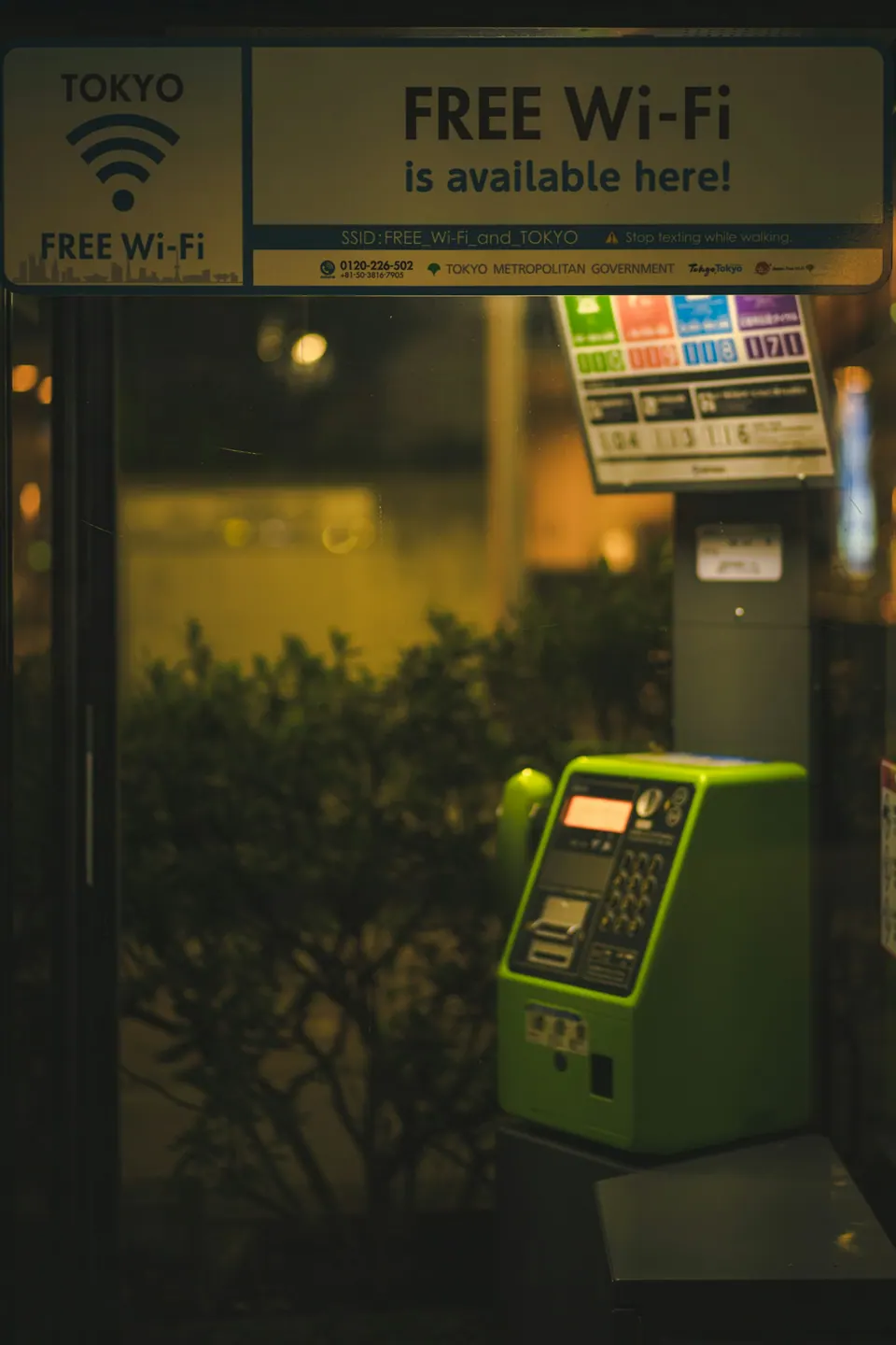 A Tokyo public telephone booth advertising free Wi-Fi
