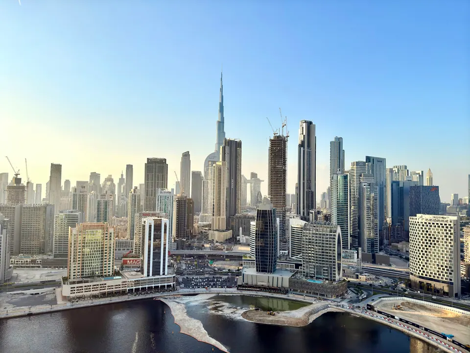 Dubai skyline and Business Bay waterfront with the Burj Khalifa